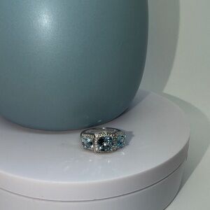 Blue topaz and white diamond ring